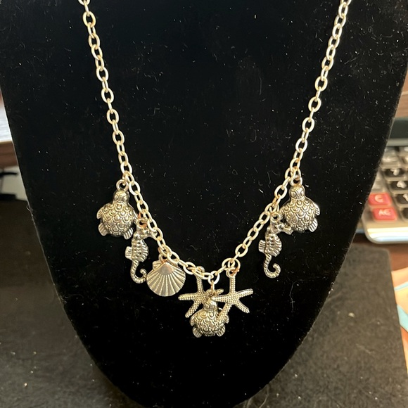 Jewelry - Beach style necklace silver tone measuring 21” inches long.